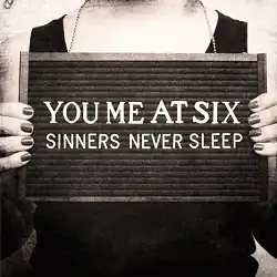 A black-and-white photo of a person from the neck down holding a placard with the artist and album names in the style of a prison mugshot