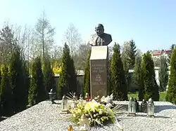 Monument of Pope John Paul II near the Holy Cross Church