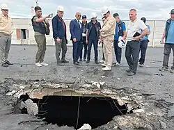 Shell damage to the roof of the building housing solid radioactive waste and fresh nuclear fuel, September 2022