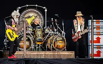 ZZ Top performing at Tons of Rock 2024. From left: Elwood Francis, Frank Beard, Billy Gibbons