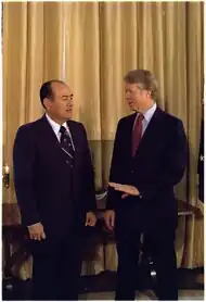 A photograph of Carlos Humberto Romero and Jimmy Carter talking to each other