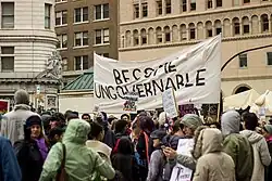 a banner marked "become ungovernable"