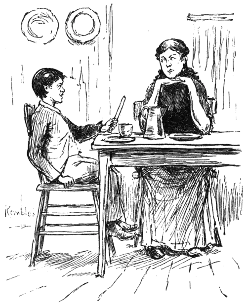 boy and woman talking across supper table