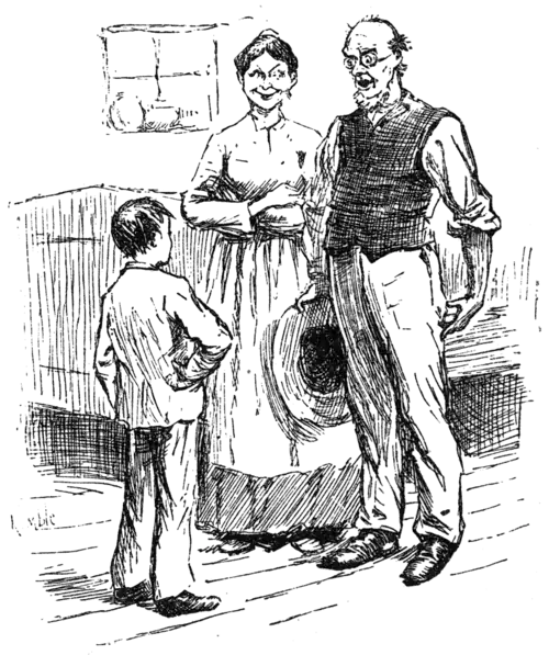 woman and man looking at boy