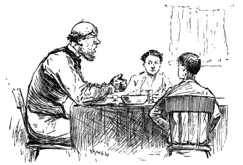 boys listening to man say blessing, sitting at dinner table