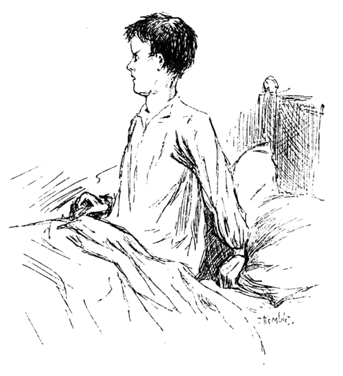 angry boy sitting up in bed