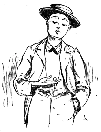 boy looking at something in his hand