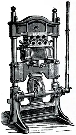 Cross-hatched illustration of a blocking machine.