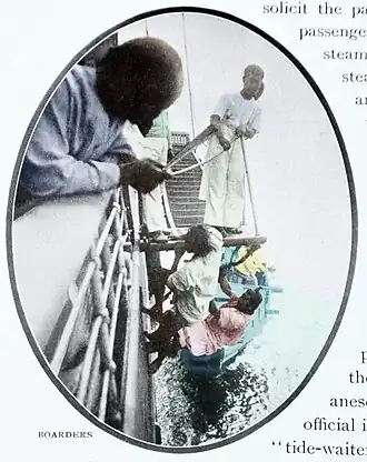 In this picture, some young men from a rowboat are grabbing the beams under the ship's gangway and pulling themselves up on to the platform.