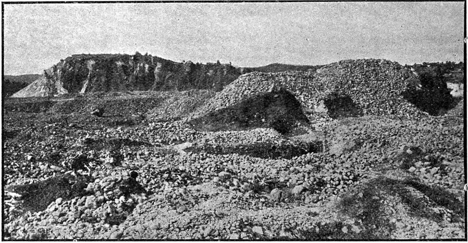 A barren stony and hilly landscape - the result from being sluiced for gold mining