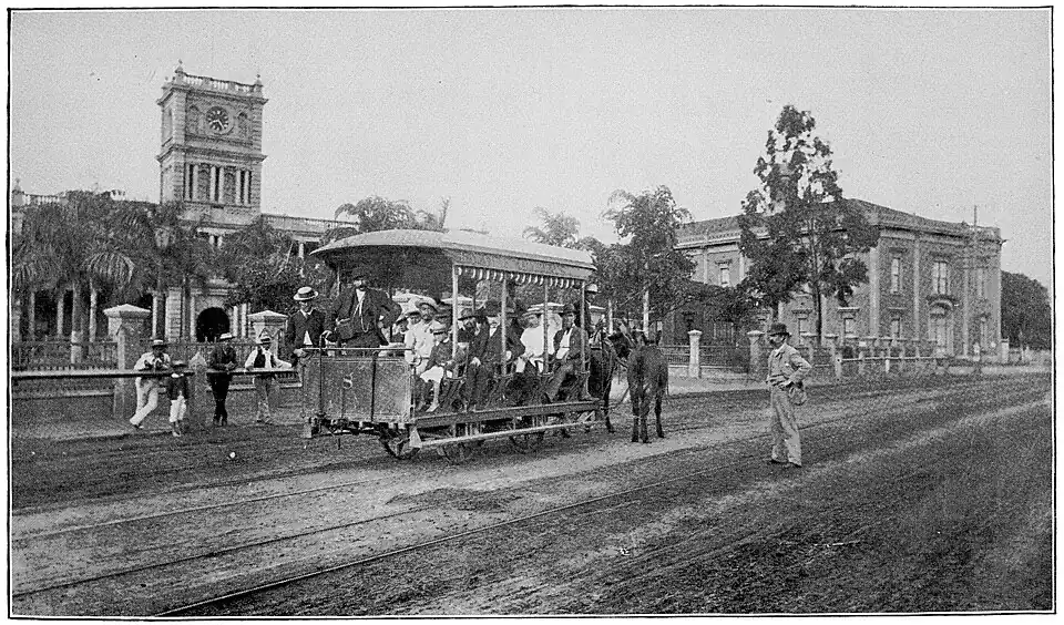 A trolley car on the street