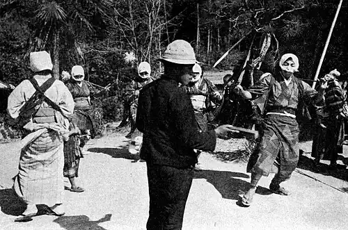 Niwaka Dance—The Man in the Foreground Keeps Time.