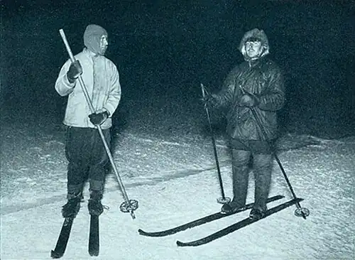 Photo of two men on skis