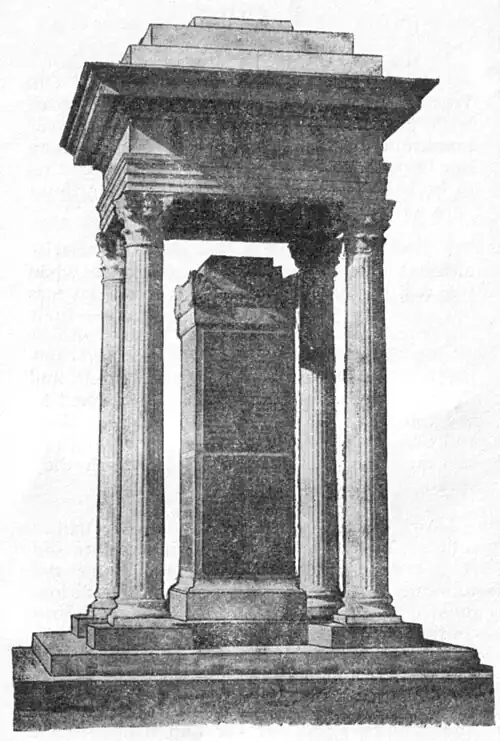 Memorial in Hokitika to West Coast people who have died in conflicts. Four columns on a stepped base, with an elaborate roof and open on each side. In the center is a column with the names of the fallen inscribed.