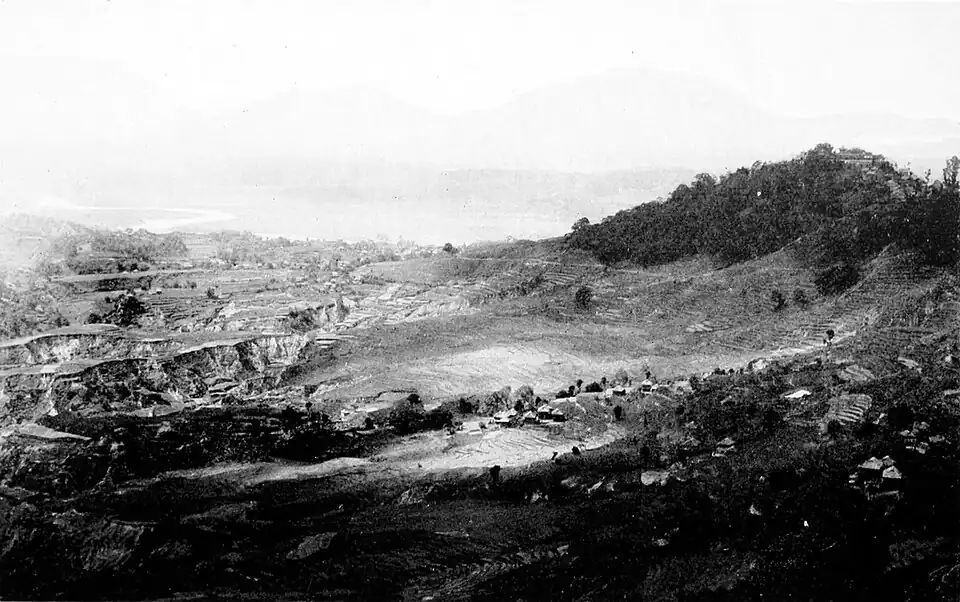 Black and white photograph of a view of the Nepal Valley, showing the effects of erosion.