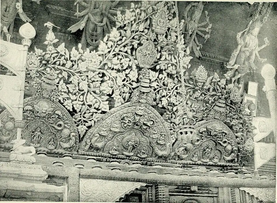 Black and white photograph of metal work on a temple front at Katmandu.