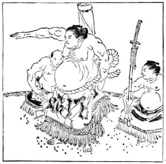 THE “INVINCIBLE CHAMPION” WITH HIS “ROPE-BELT.”