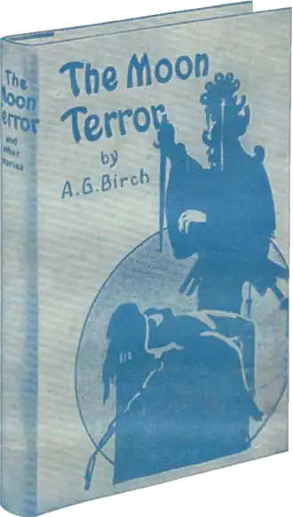 Monochrome blue-tinted photograph of a copy of The Moon Terror, a hard-backed book illustrated with a woman tied to an altar and an ornately dressed man about to sacrifice her; with a large moon or circle in the background.