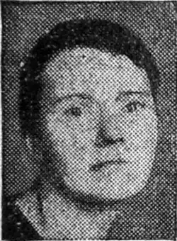 Photograph of a glum looking woman