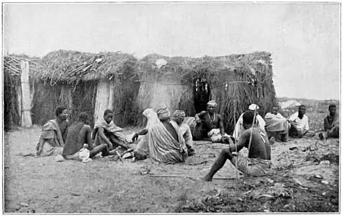 Round a Kacongo Camp Fire.