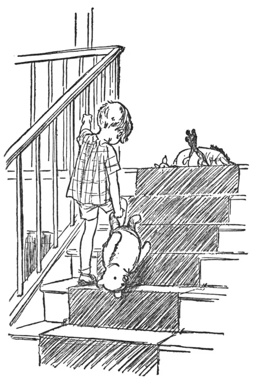 Christopher Robin walking upstairs, dragging Winnie-the-Pooh behind him