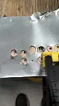 A few examples of failed attempts at drilling out washers.