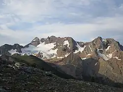 A range of mountains with glaciers on them