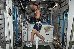 Astronaut running on a track