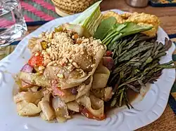 Lao-style tam mak hung green papaya salad