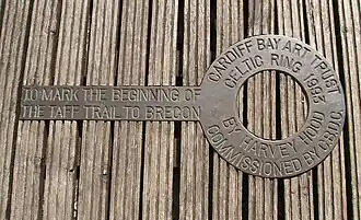 A key-shaped bronze pointer to mark the start of the Taff Trail