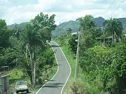 Driving through a scenic, hilly road in Barrio Vaga.